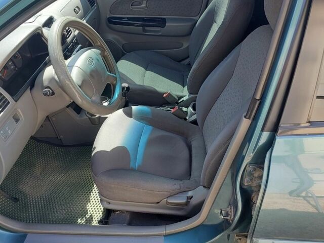 Зелений Кіа Ріо, об'ємом двигуна 0 л та пробігом 322 тис. км за 2692 $, фото 6 на Automoto.ua