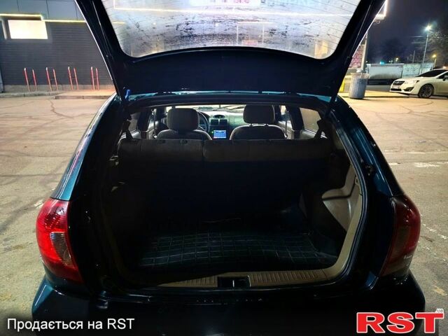 Зеленый Киа Рио, объемом двигателя 1.3 л и пробегом 0 тыс. км за 2500 $, фото 10 на Automoto.ua