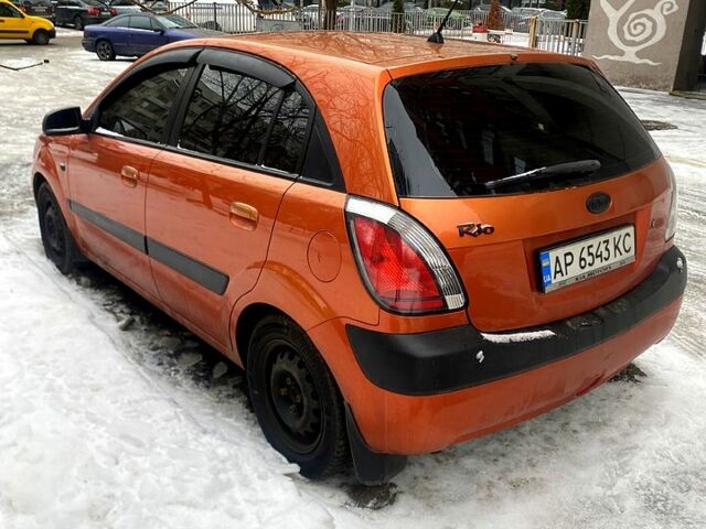 Оранжевый Киа Рио, объемом двигателя 1.4 л и пробегом 25900 тыс. км за 4200 $, фото 5 на Automoto.ua