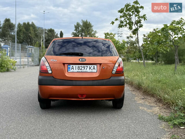 Помаранчевий Кіа Ріо, об'ємом двигуна 1.4 л та пробігом 164 тис. км за 5250 $, фото 3 на Automoto.ua