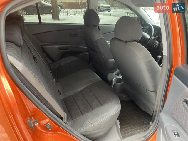 Оранжевый Киа Рио, объемом двигателя 1.4 л и пробегом 259 тыс. км за 4200 $, фото 10 на Automoto.ua