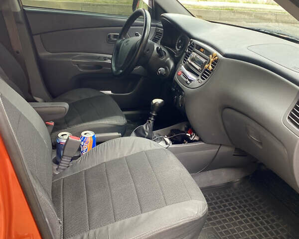 Оранжевый Киа Рио, объемом двигателя 1.4 л и пробегом 258 тыс. км за 4600 $, фото 23 на Automoto.ua