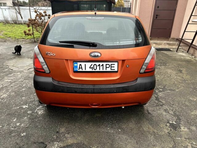 Оранжевый Киа Рио, объемом двигателя 1.4 л и пробегом 150 тыс. км за 4200 $, фото 5 на Automoto.ua