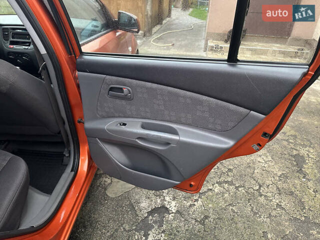 Оранжевый Киа Рио, объемом двигателя 1.4 л и пробегом 150 тыс. км за 4200 $, фото 15 на Automoto.ua