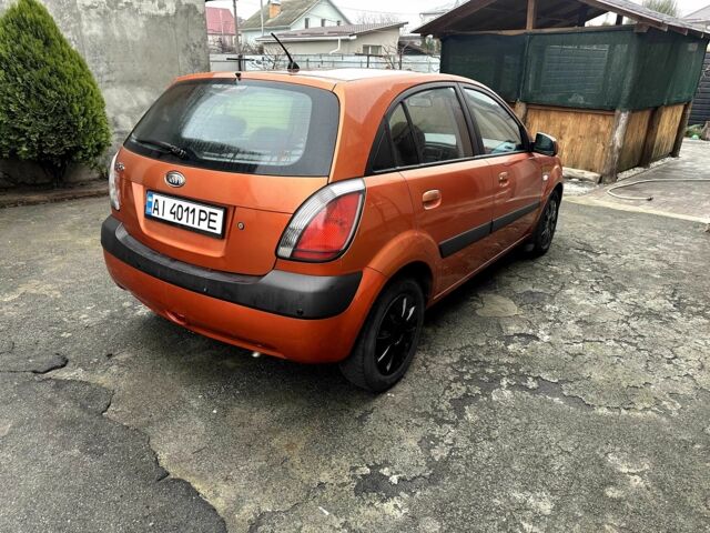 Оранжевый Киа Рио, объемом двигателя 1.4 л и пробегом 150 тыс. км за 4200 $, фото 4 на Automoto.ua