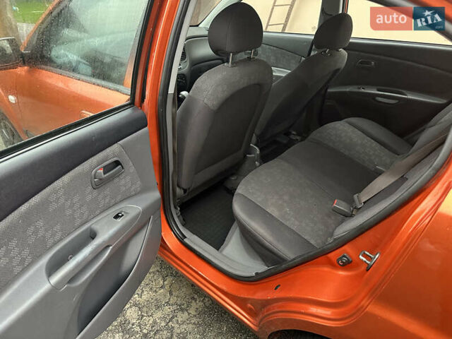Оранжевый Киа Рио, объемом двигателя 1.4 л и пробегом 150 тыс. км за 4200 $, фото 10 на Automoto.ua