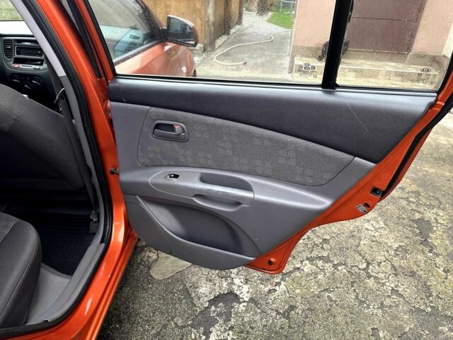 Оранжевый Киа Рио, объемом двигателя 1.4 л и пробегом 150 тыс. км за 4200 $, фото 15 на Automoto.ua