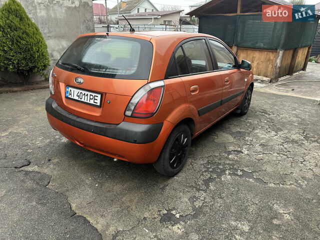Оранжевый Киа Рио, объемом двигателя 1.4 л и пробегом 150 тыс. км за 4200 $, фото 4 на Automoto.ua
