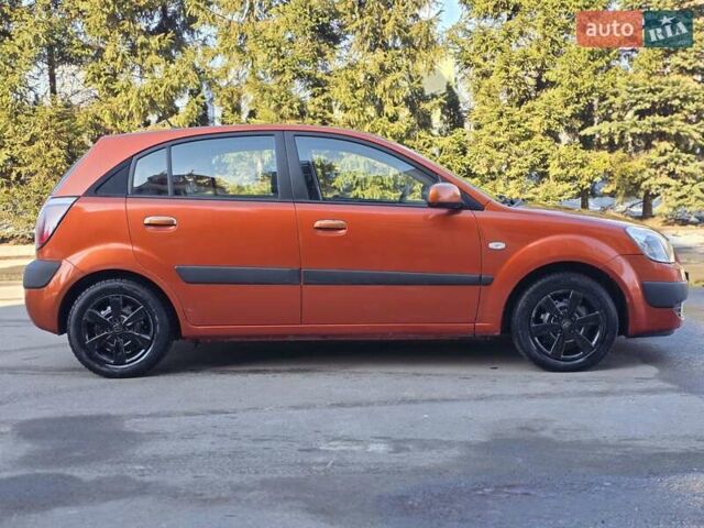 Оранжевый Киа Рио, объемом двигателя 1.4 л и пробегом 232 тыс. км за 3999 $, фото 9 на Automoto.ua