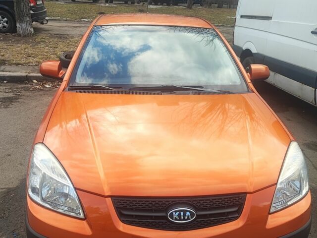 Оранжевый Киа Рио, объемом двигателя 1.4 л и пробегом 235 тыс. км за 5000 $, фото 1 на Automoto.ua