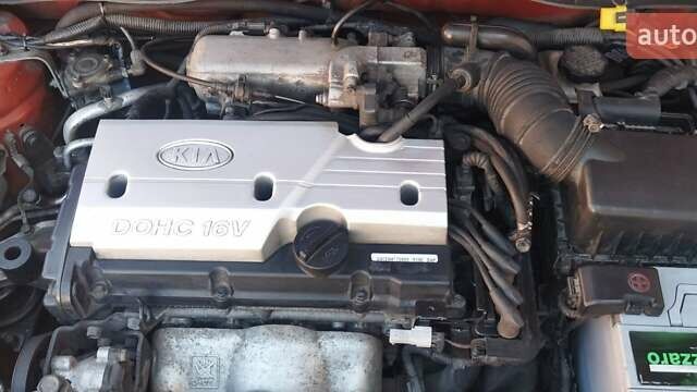 Помаранчевий Кіа Ріо, об'ємом двигуна 1.4 л та пробігом 164 тис. км за 5600 $, фото 14 на Automoto.ua