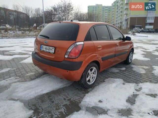 Помаранчевий Кіа Ріо, об'ємом двигуна 1.4 л та пробігом 210 тис. км за 4500 $, фото 2 на Automoto.ua