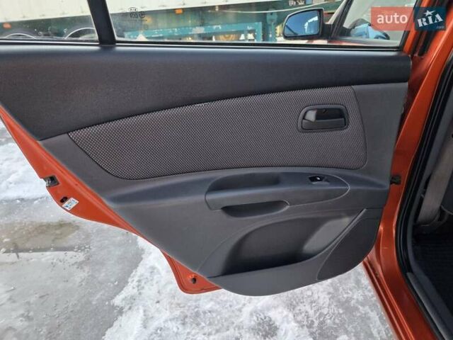 Оранжевый Киа Рио, объемом двигателя 1.4 л и пробегом 232 тыс. км за 3999 $, фото 20 на Automoto.ua