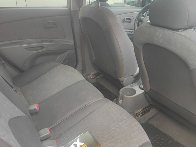 Оранжевый Киа Рио, объемом двигателя 1.4 л и пробегом 235 тыс. км за 5000 $, фото 7 на Automoto.ua