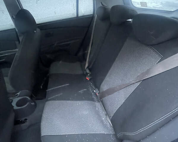 Оранжевый Киа Рио, объемом двигателя 1.4 л и пробегом 232 тыс. км за 4650 $, фото 6 на Automoto.ua