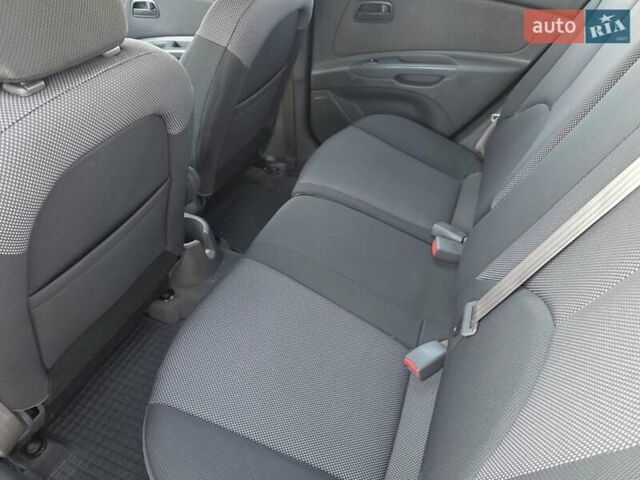 Оранжевый Киа Рио, объемом двигателя 1.4 л и пробегом 232 тыс. км за 3999 $, фото 18 на Automoto.ua