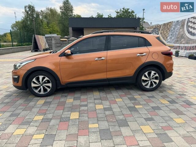 Оранжевый Киа Рио, объемом двигателя 1.59 л и пробегом 83 тыс. км за 13500 $, фото 4 на Automoto.ua