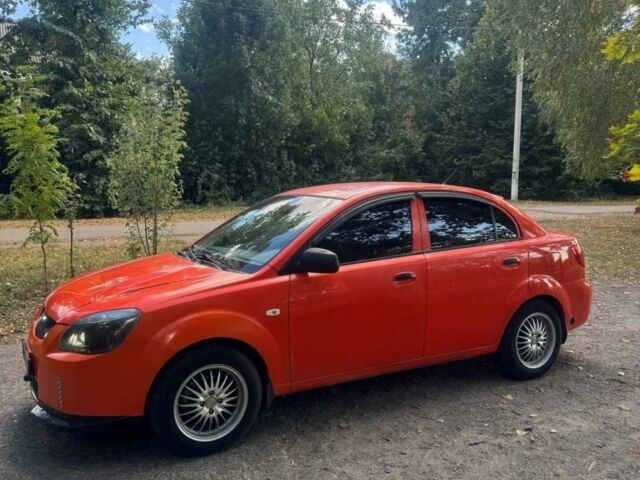 Оранжевый Киа Рио, объемом двигателя 1.4 л и пробегом 235 тыс. км за 4100 $, фото 5 на Automoto.ua