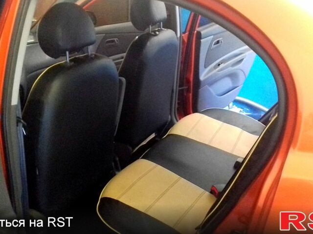 Оранжевый Киа Рио, объемом двигателя 1.3 л и пробегом 138 тыс. км за 5500 $, фото 12 на Automoto.ua