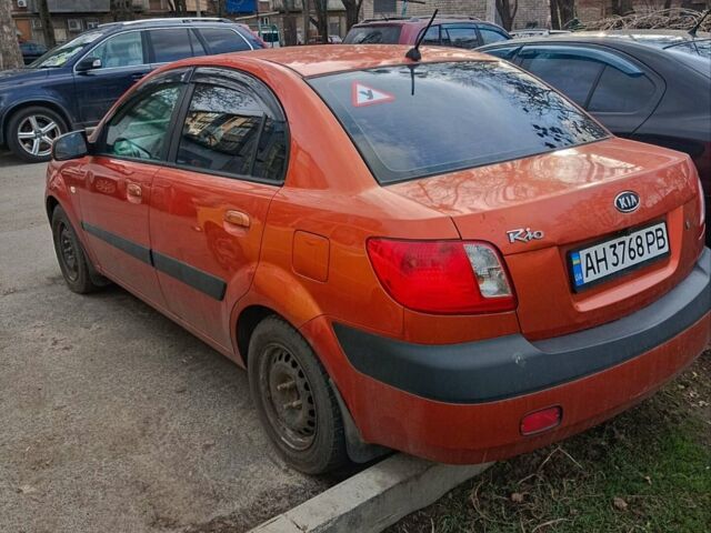 Помаранчевий Кіа Ріо, об'ємом двигуна 1.4 л та пробігом 241 тис. км за 5000 $, фото 1 на Automoto.ua