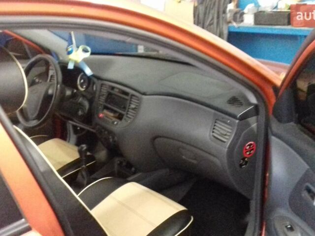 Помаранчевий Кіа Ріо, об'ємом двигуна 1.34 л та пробігом 138 тис. км за 5500 $, фото 14 на Automoto.ua