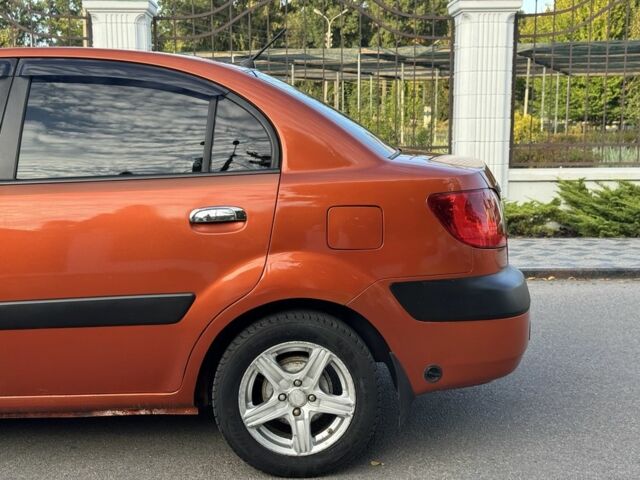 Помаранчевий Кіа Ріо, об'ємом двигуна 1.4 л та пробігом 152 тис. км за 4651 $, фото 5 на Automoto.ua