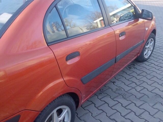 Помаранчевий Кіа Ріо, об'ємом двигуна 1.4 л та пробігом 447 тис. км за 3900 $, фото 6 на Automoto.ua