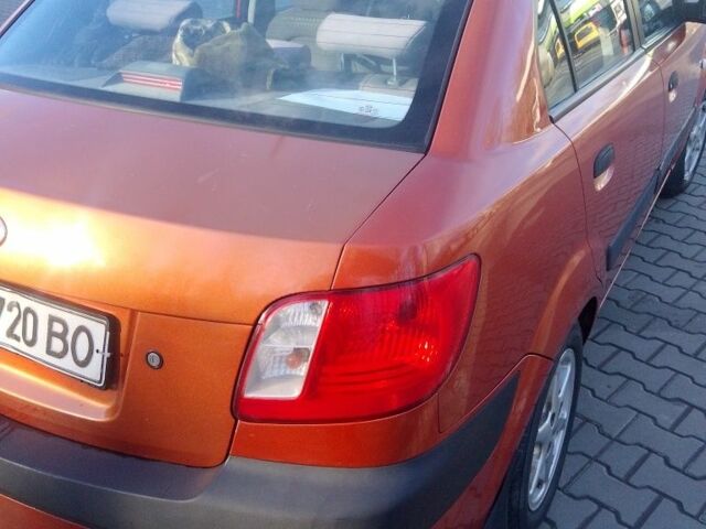 Помаранчевий Кіа Ріо, об'ємом двигуна 1.4 л та пробігом 447 тис. км за 3900 $, фото 5 на Automoto.ua