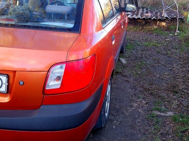 Оранжевый Киа Рио, объемом двигателя 1.4 л и пробегом 0 тыс. км за 3600 $, фото 2 на Automoto.ua