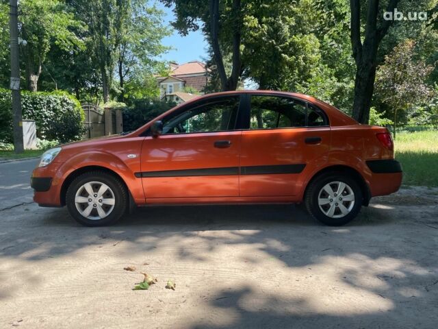 Помаранчевий Кіа Ріо, об'ємом двигуна 1.4 л та пробігом 124 тис. км за 4390 $, фото 11 на Automoto.ua
