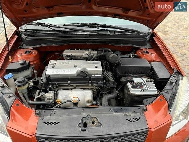 Оранжевый Киа Рио, объемом двигателя 1.4 л и пробегом 186 тыс. км за 4300 $, фото 3 на Automoto.ua