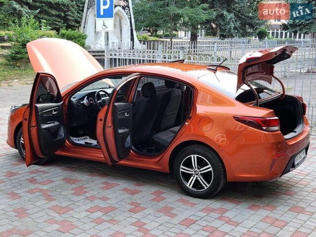 Оранжевый Киа Рио, объемом двигателя 1.59 л и пробегом 43 тыс. км за 14700 $, фото 47 на Automoto.ua