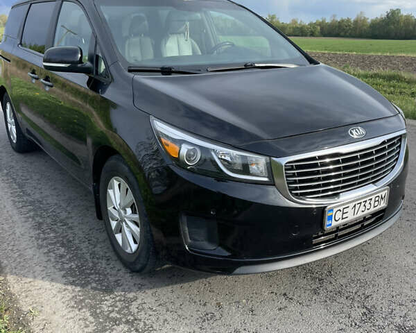 Черный Киа Седона, объемом двигателя 3.34 л и пробегом 191 тыс. км за 13500 $, фото 1 на Automoto.ua