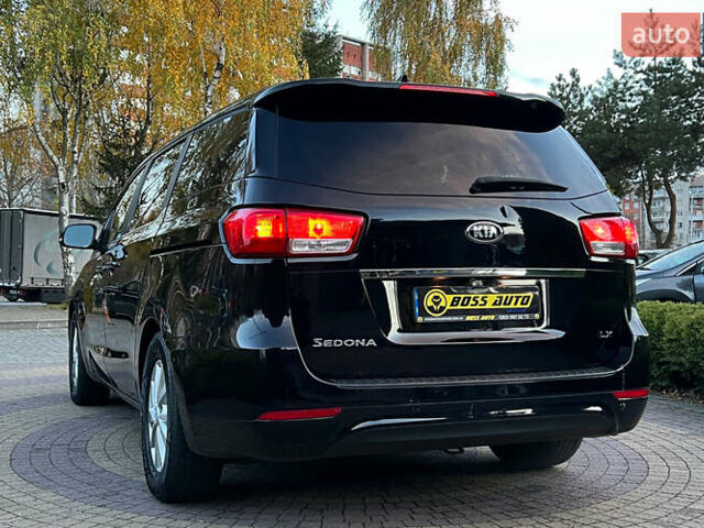 Черный Киа Седона, объемом двигателя 3.34 л и пробегом 181 тыс. км за 13999 $, фото 4 на Automoto.ua