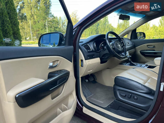 Красный Киа Седона, объемом двигателя 3.34 л и пробегом 126 тыс. км за 14990 $, фото 23 на Automoto.ua