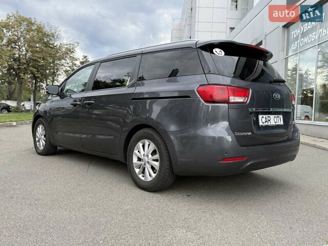 Серый Киа Седона, объемом двигателя 3.34 л и пробегом 125 тыс. км за 14800 $, фото 4 на Automoto.ua