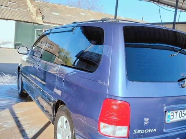 Синий Киа Седона, объемом двигателя 3.5 л и пробегом 300 тыс. км за 3700 $, фото 1 на Automoto.ua