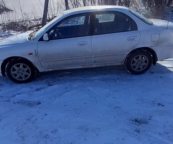 Белый Киа Сефия, объемом двигателя 0 л и пробегом 165 тыс. км за 1600 $, фото 2 на Automoto.ua