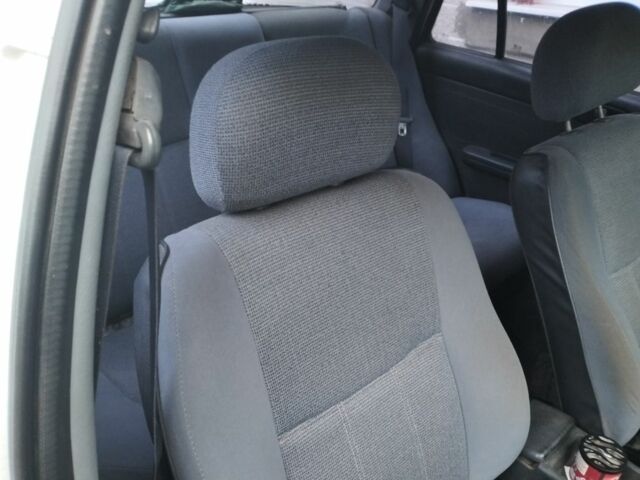 Белый Киа Сефия, объемом двигателя 0 л и пробегом 288 тыс. км за 500 $, фото 4 на Automoto.ua