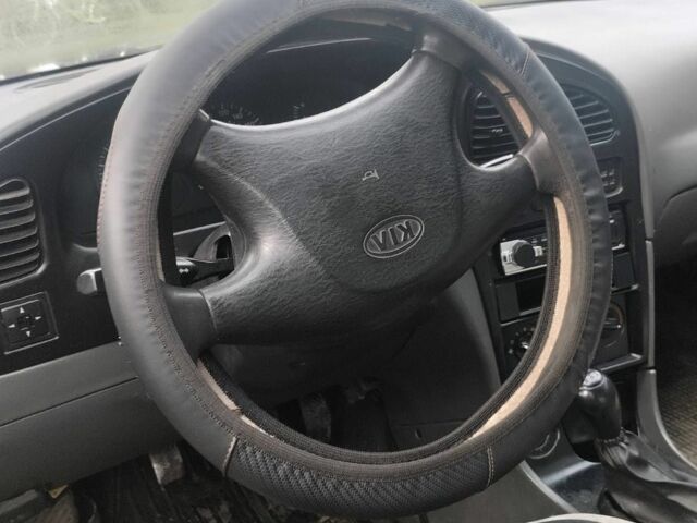 Белый Киа Сефия, объемом двигателя 1.5 л и пробегом 200 тыс. км за 1400 $, фото 4 на Automoto.ua