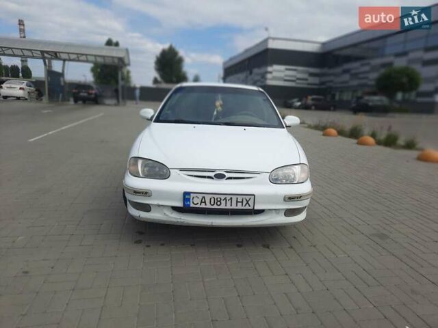 Білий Кіа Сефія, об'ємом двигуна 1.5 л та пробігом 350 тис. км за 1250 $, фото 2 на Automoto.ua