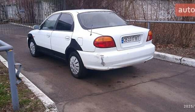 Белый Киа Сефия, объемом двигателя 1.5 л и пробегом 340 тыс. км за 1400 $, фото 2 на Automoto.ua
