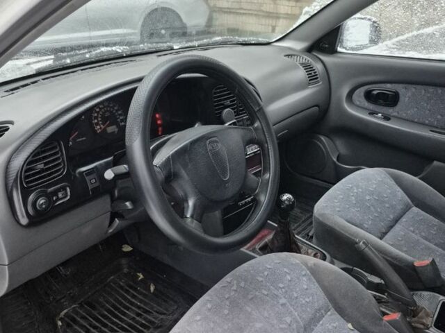 Белый Киа Сефия, объемом двигателя 1.6 л и пробегом 330 тыс. км за 2600 $, фото 3 на Automoto.ua