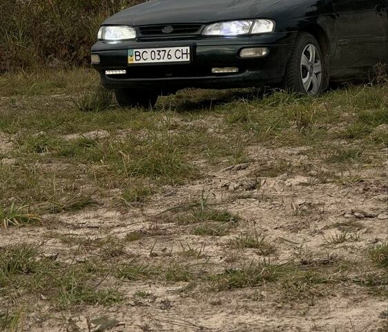 Бежевый Киа Сефия, объемом двигателя 1.5 л и пробегом 318 тыс. км за 1550 $, фото 2 на Automoto.ua