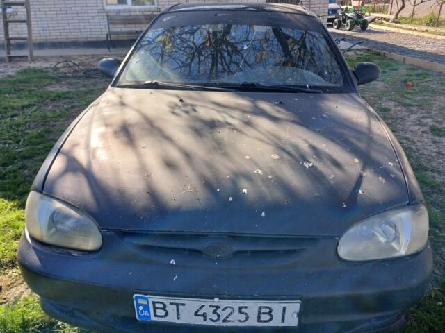 Черный Киа Сефия, объемом двигателя 1.5 л и пробегом 465 тыс. км за 900 $, фото 3 на Automoto.ua