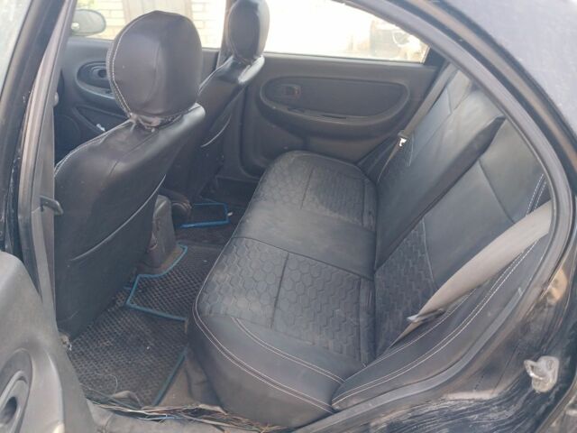 Черный Киа Сефия, объемом двигателя 1.5 л и пробегом 465 тыс. км за 900 $, фото 5 на Automoto.ua