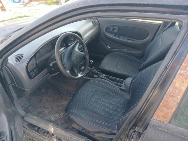 Черный Киа Сефия, объемом двигателя 1.5 л и пробегом 465 тыс. км за 900 $, фото 4 на Automoto.ua