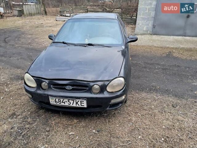 Чорний Кіа Сефія, об'ємом двигуна 1.5 л та пробігом 300 тис. км за 1200 $, фото 2 на Automoto.ua