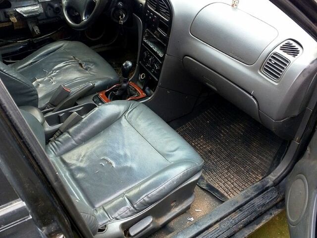 Черный Киа Сефия, объемом двигателя 2 л и пробегом 0 тыс. км за 650 $, фото 3 на Automoto.ua