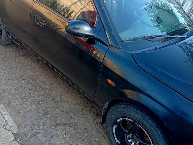 Чорний Кіа Сефія, об'ємом двигуна 1.5 л та пробігом 0 тис. км за 1550 $, фото 9 на Automoto.ua
